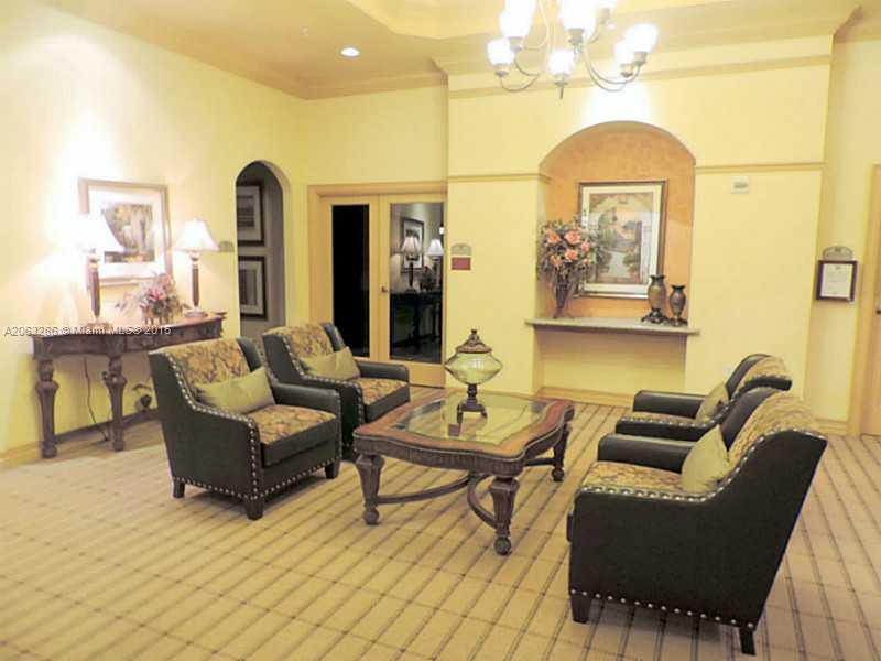 888 Douglas Road, Unit 1016 Coral Gables, FL 33134 - Photo 28 of 34 a living room with furniture and a chandelier