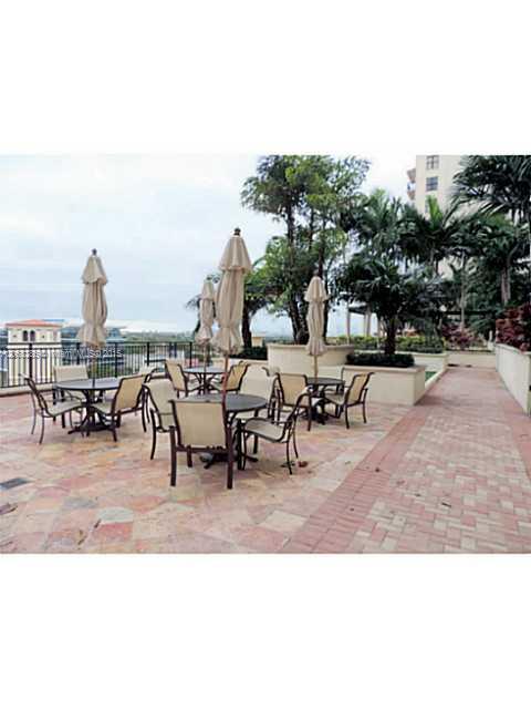 888 Douglas Road, Unit 1016 Coral Gables, FL 33134 - Photo 29 of 34 a view of outdoor space with seating area