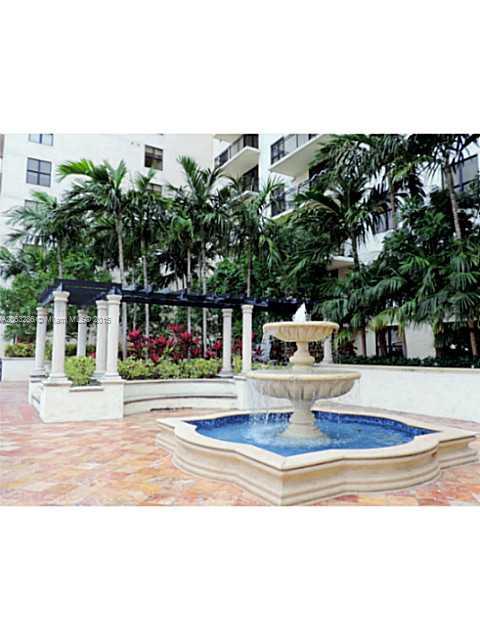 888 Douglas Road, Unit 1016 Coral Gables, FL 33134 - Photo 30 of 34 a view of street with houses