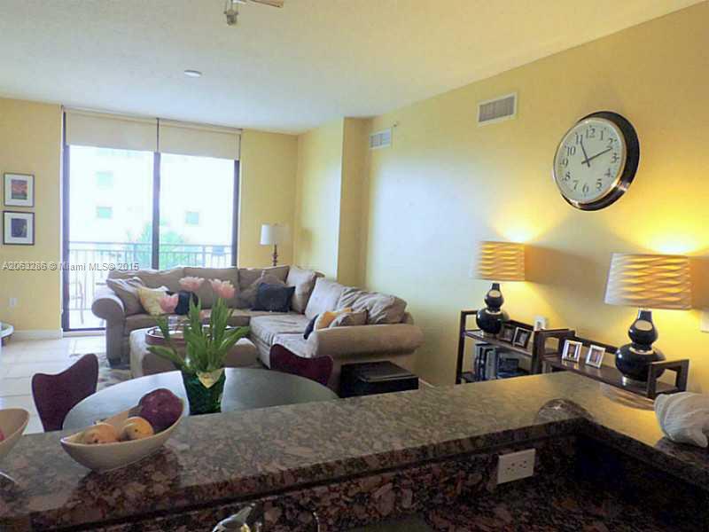 888 Douglas Road, Unit 1016 Coral Gables, FL 33134 - Photo 4 of 34 a living room with furniture flowerpot and window