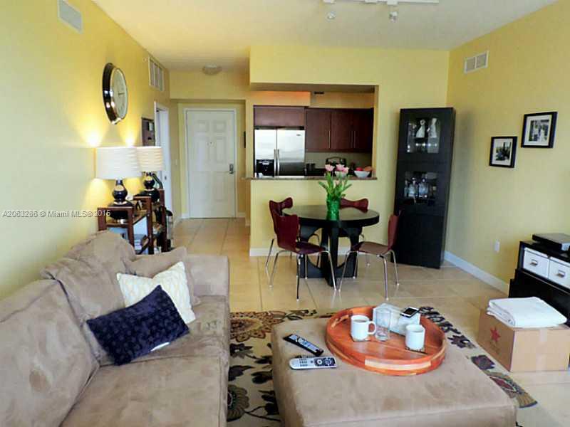 888 Douglas Road, Unit 1016 Coral Gables, FL 33134 - Photo 6 of 34 a living room with furniture and a wooden floor
