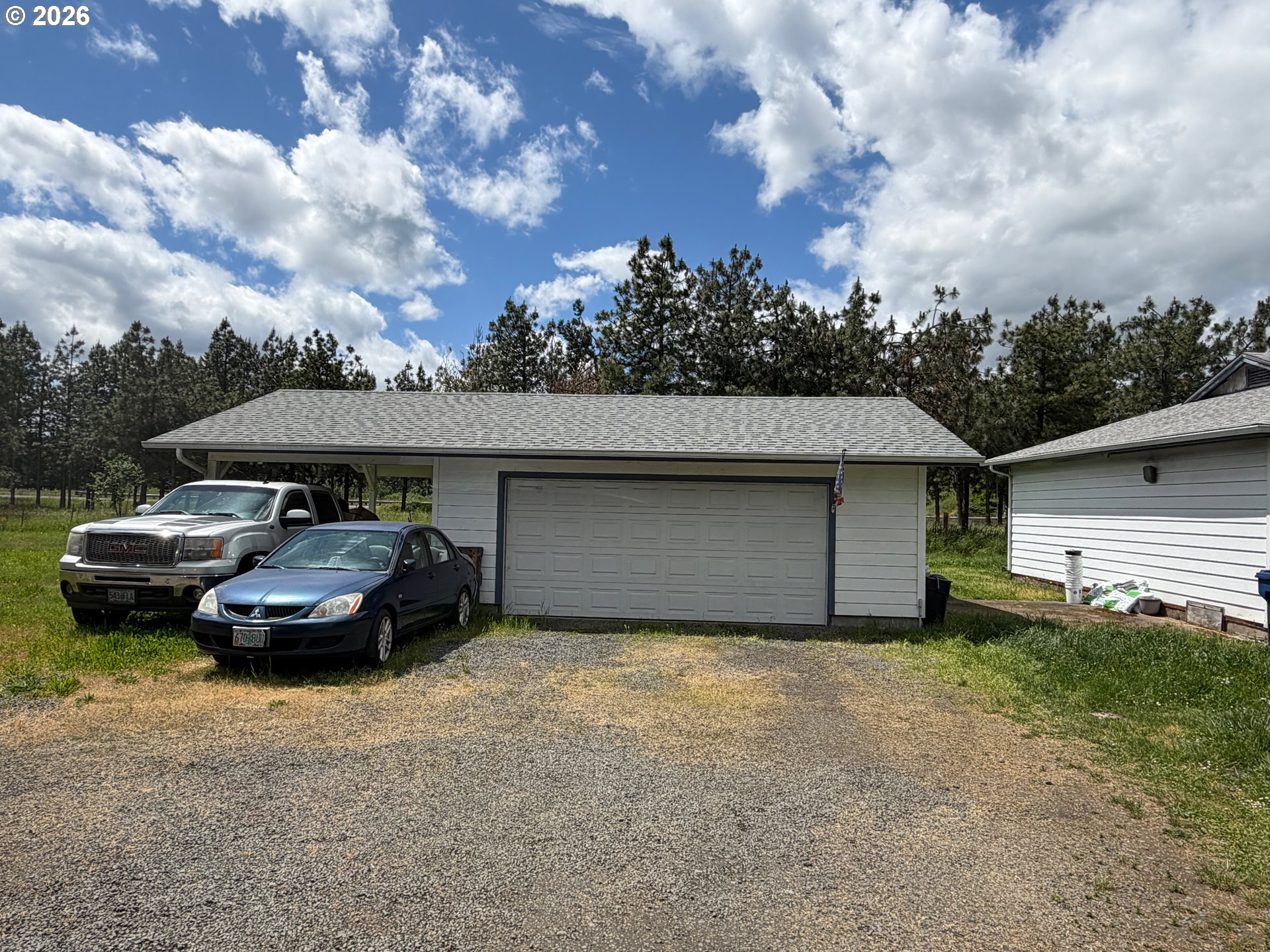 33802 Market Road Creswell, OR 97426 - Photo 16 of 30 a front view of a house with a garden
