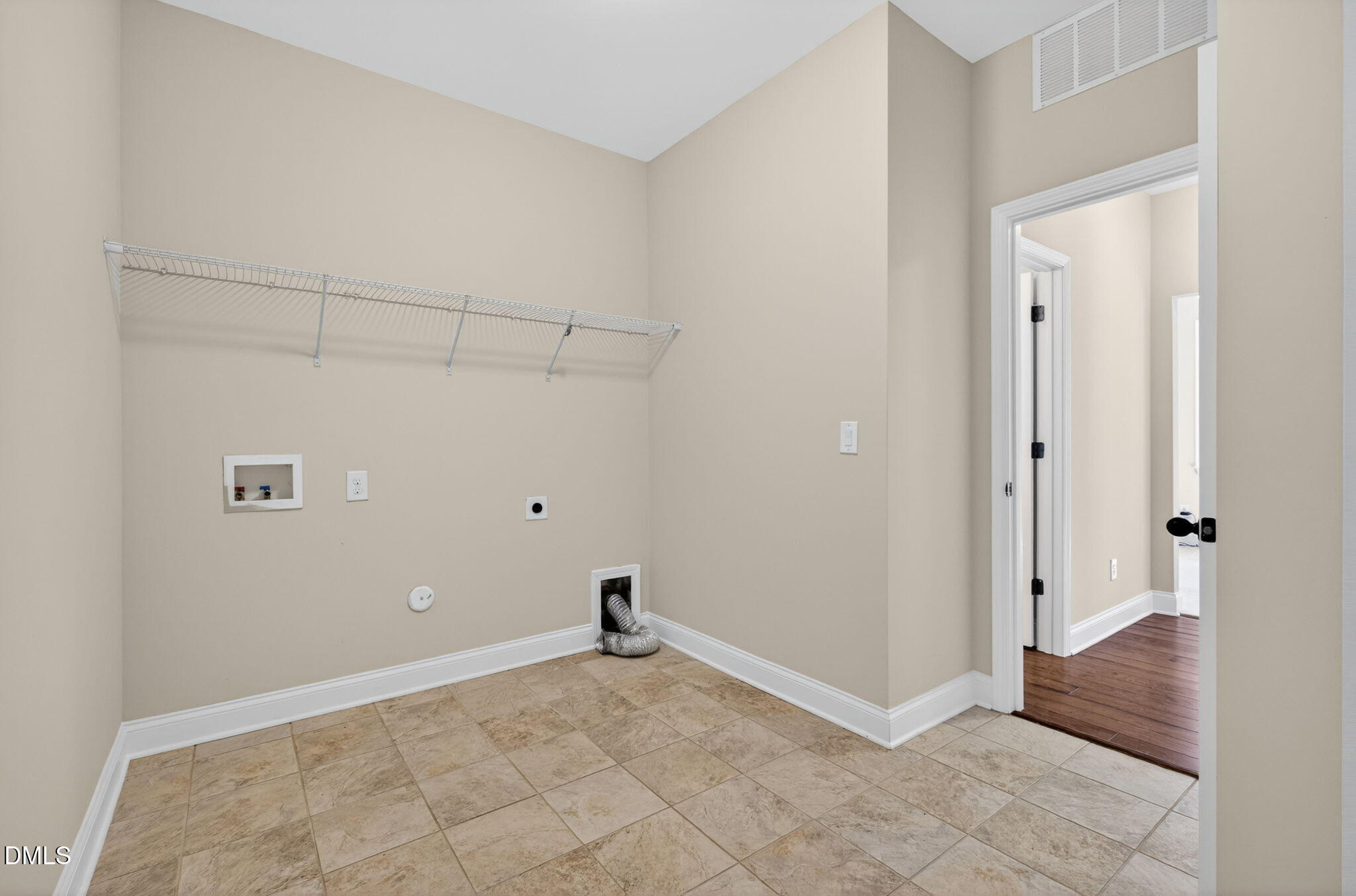 1304 Barnford Mill Road Wake Forest, NC 27587 - Photo 17 of 44 an empty room with an entryway
