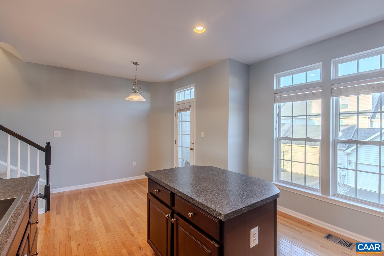 339 Rolkin Road Charlottesville, VA 22911 - Photo 15 of 43 a room with window and wooden floor