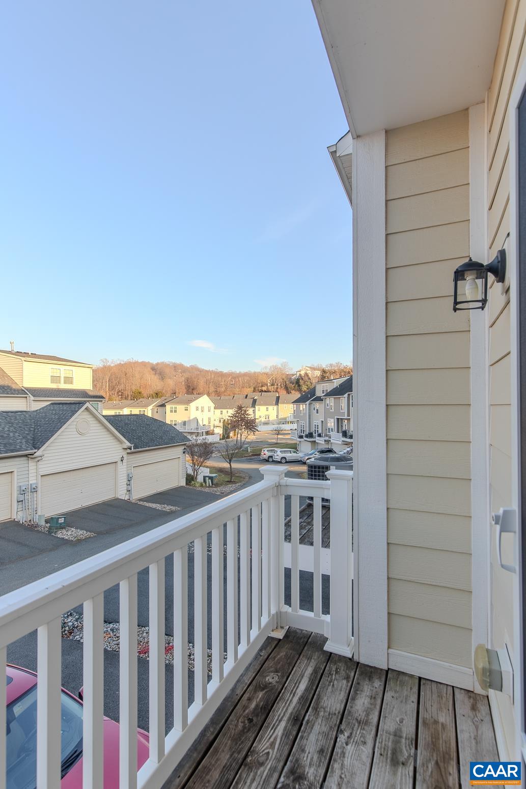 339 Rolkin Road Charlottesville, VA 22911 - Photo 16 of 43 a view of a balcony with wooden floor