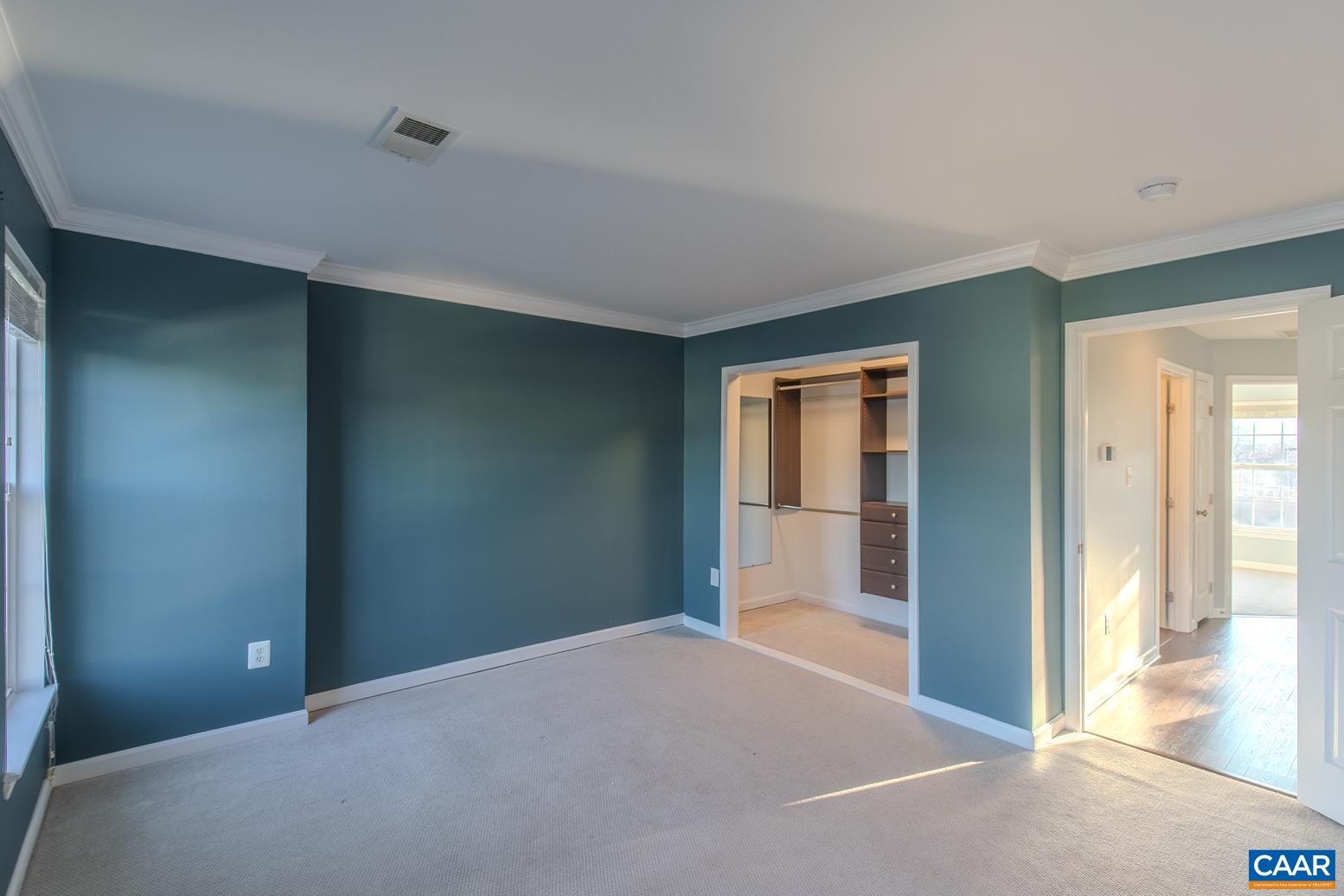 339 Rolkin Road Charlottesville, VA 22911 - Photo 19 of 43 a view of an empty room with glass door