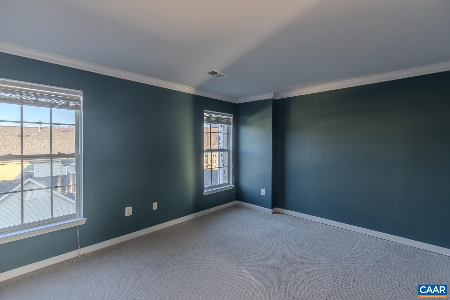 339 Rolkin Road Charlottesville, VA 22911 - Photo 21 of 43 an empty room with windows