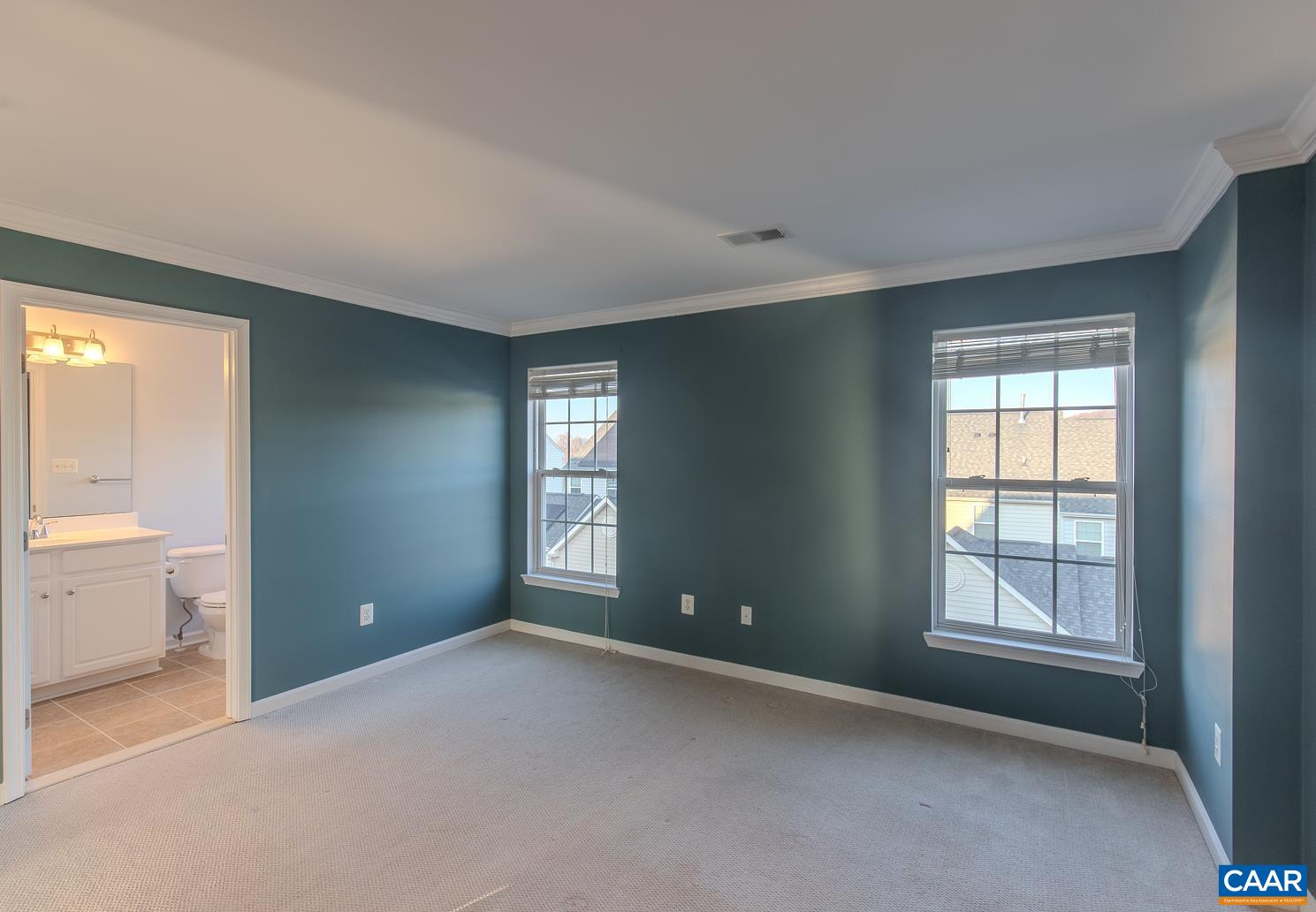339 Rolkin Road Charlottesville, VA 22911 - Photo 22 of 43 a view of an empty room with a window