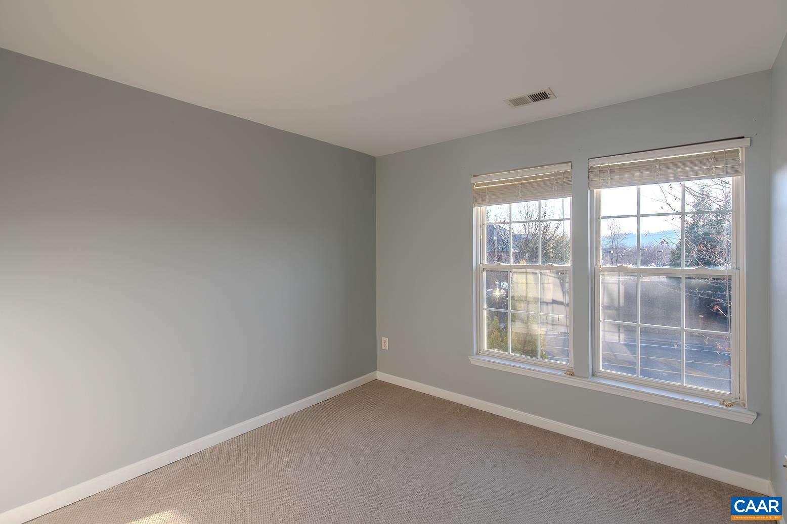 339 Rolkin Road Charlottesville, VA 22911 - Photo 27 of 43 an empty room with a window