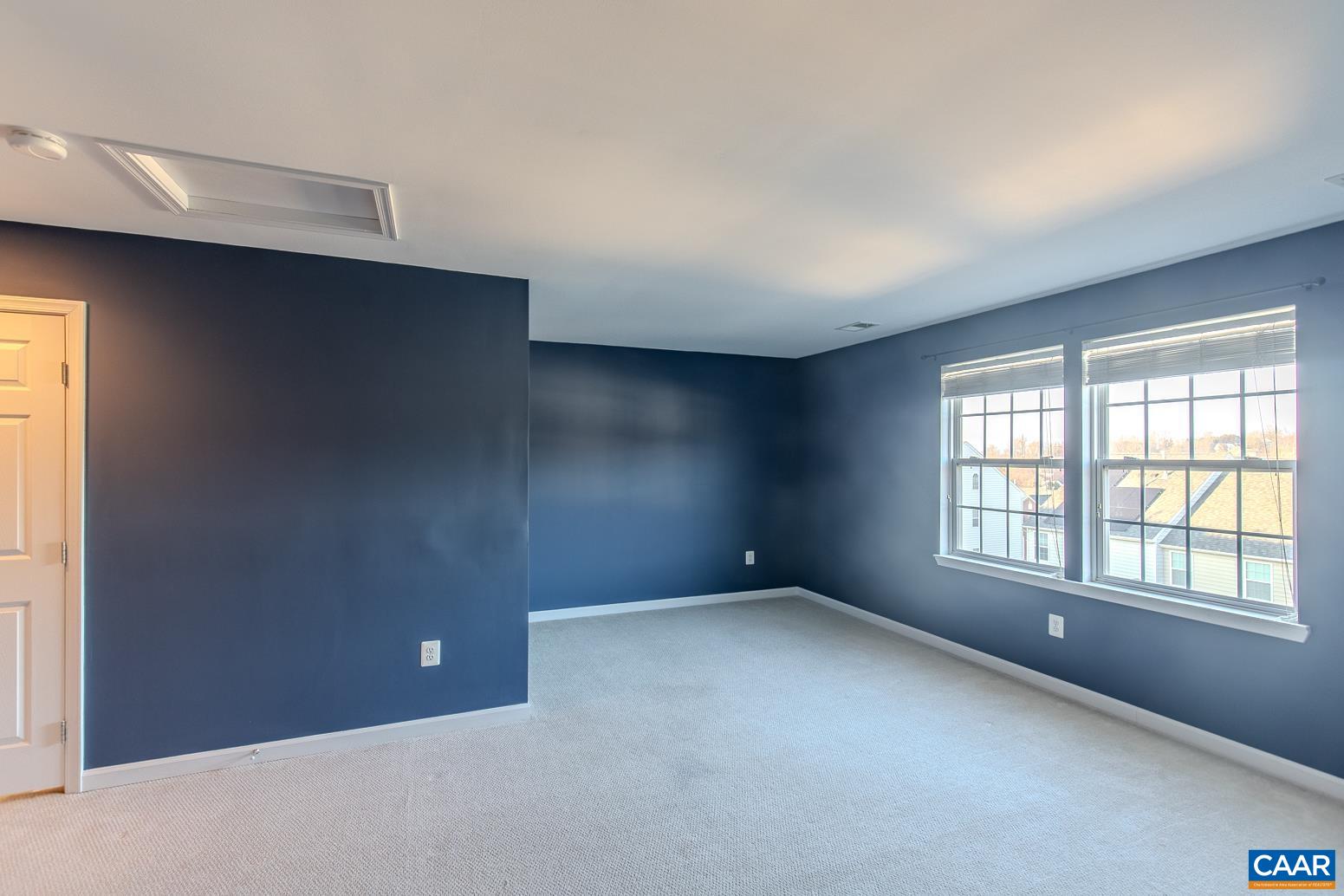 339 Rolkin Road Charlottesville, VA 22911 - Photo 30 of 43 an empty room with windows