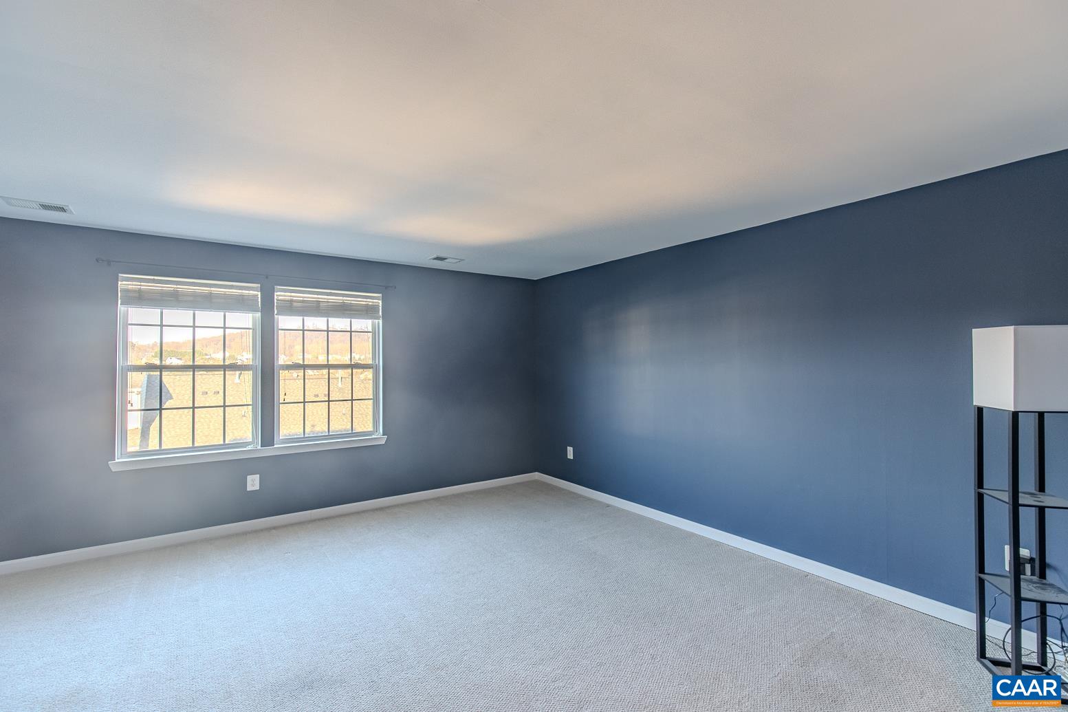339 Rolkin Road Charlottesville, VA 22911 - Photo 32 of 43 an empty room with a window