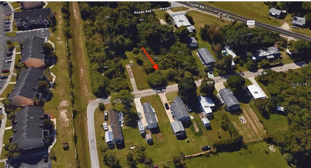1015 Elm Street Punta Gorda, FL 33950 - Photo 2 of 13 an aerial view of residential houses with outdoor space