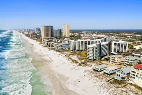 a view of city with ocean