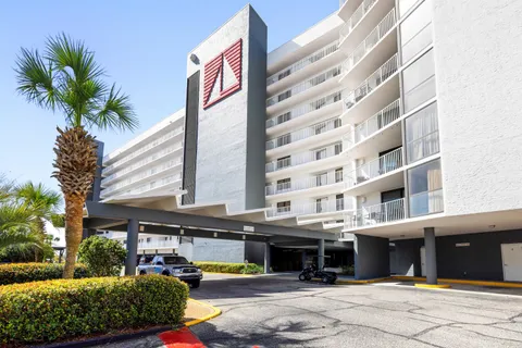 a view of swimming pool with outdoor seating