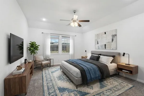 a bathroom with a sink double vanity and a mirror