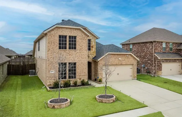 a front view of house with yard