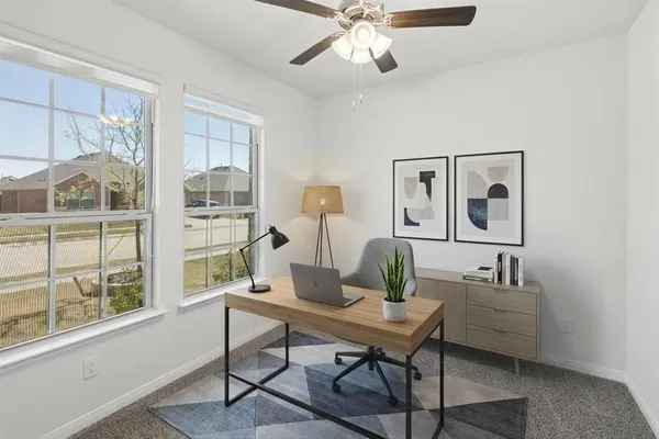 a bathroom with a sink a toilet a mirror a bathtub and shower