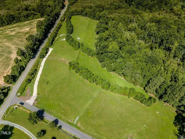 a view of swimming pool from a balcony