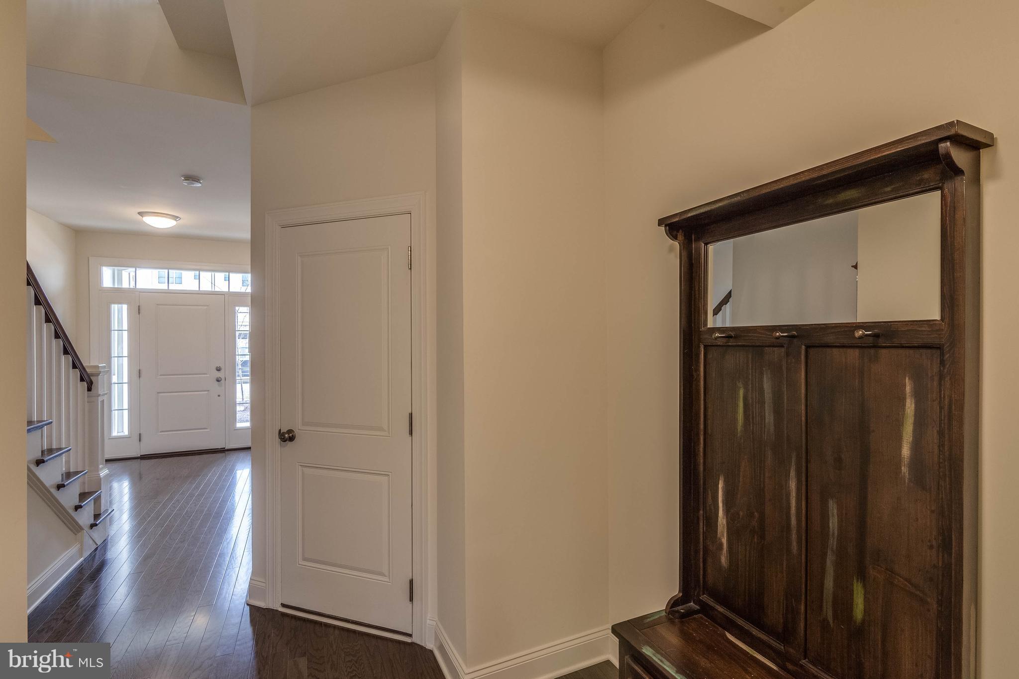 22563 Windsor Locks Square Ashburn, VA 20148 - Photo 4 of 30 Wide Foyer Entrance with Hardwood