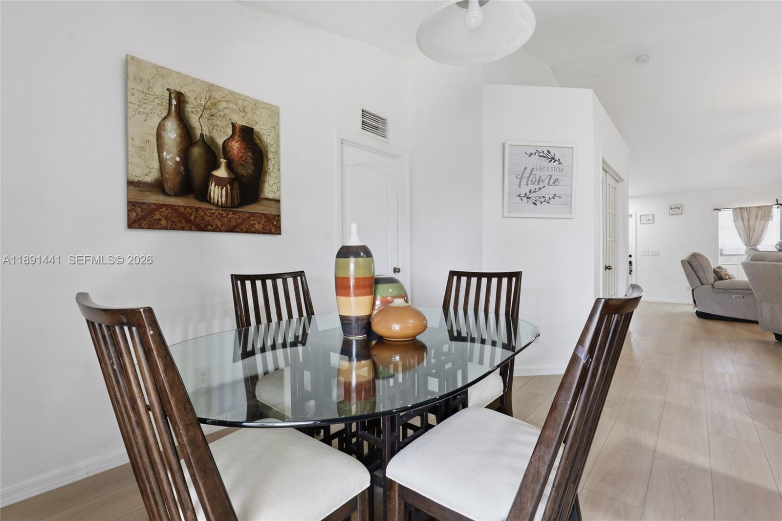 3003 25th Street West Lehigh Acres, FL 33971 - Photo 11 of 39 a view of a dining room with furniture