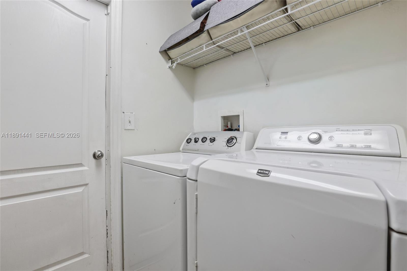 3003 25th Street West Lehigh Acres, FL 33971 - Photo 22 of 39 a utility room with dryer and washer