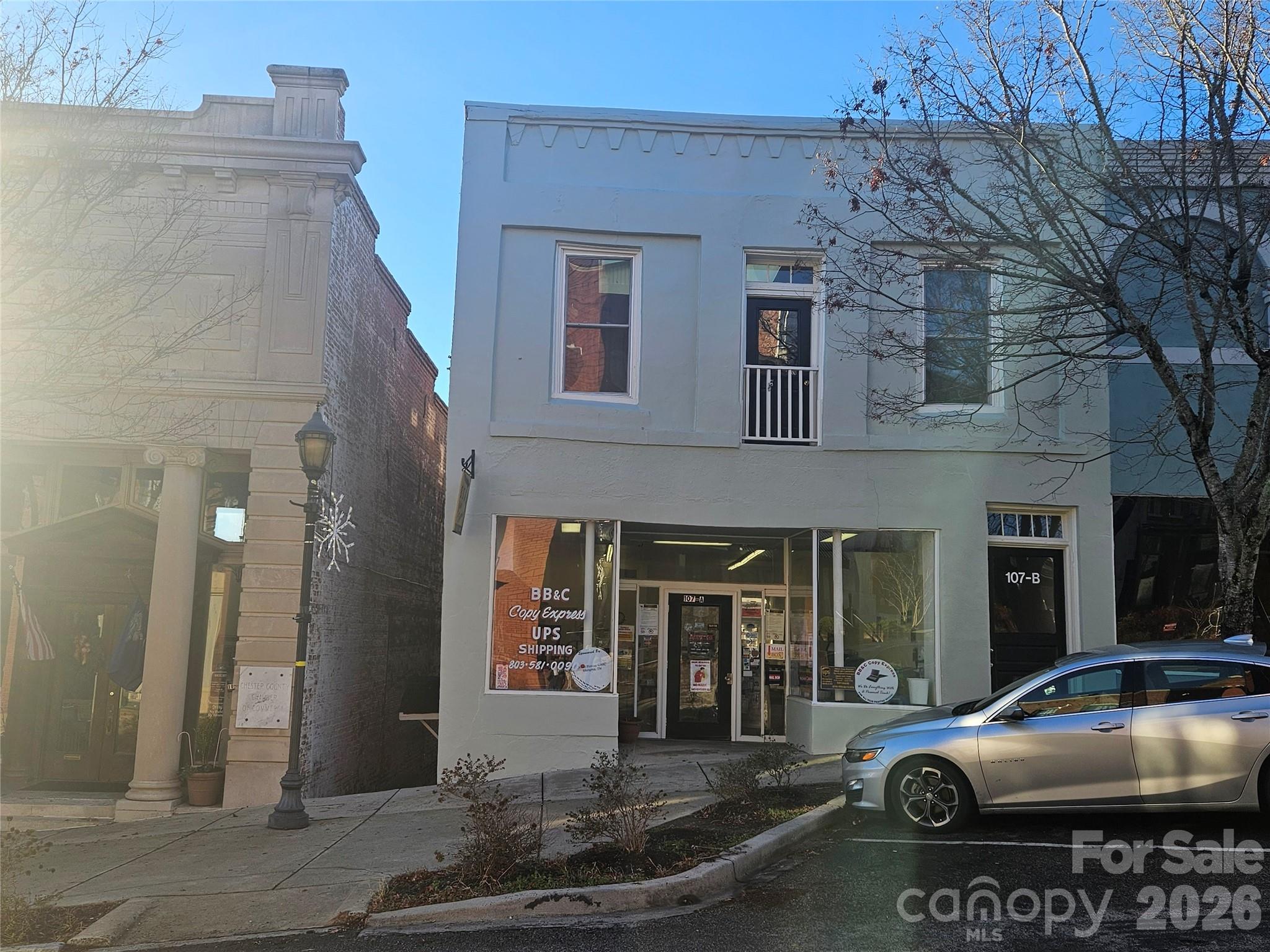 a car parked in front of a building
