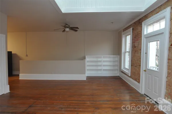 a view of an empty walk in closet