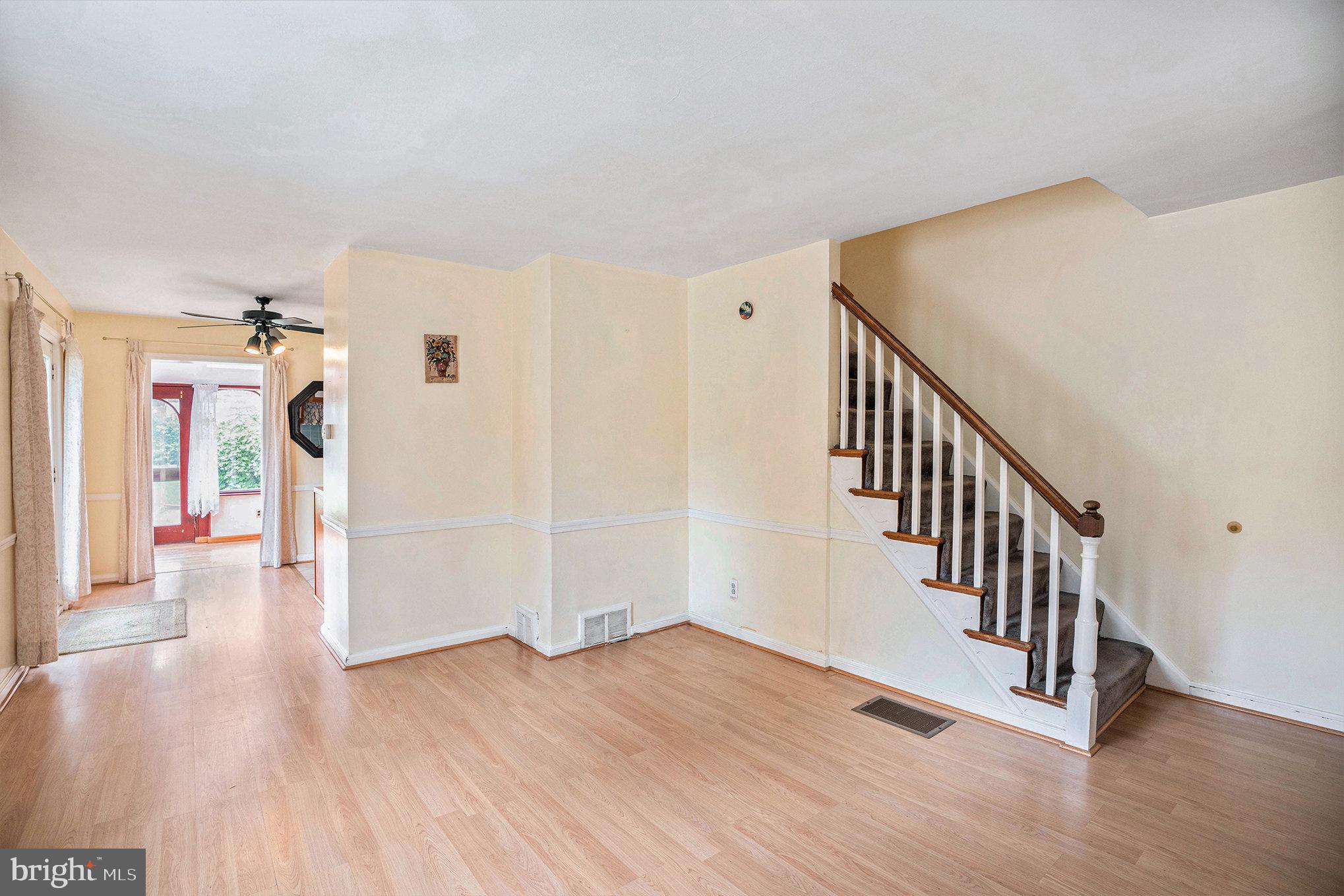 326 East Rambo Street Bridgeport, PA 19405 - Photo 13 of 26 a view of a hallway with wooden floor and staircase