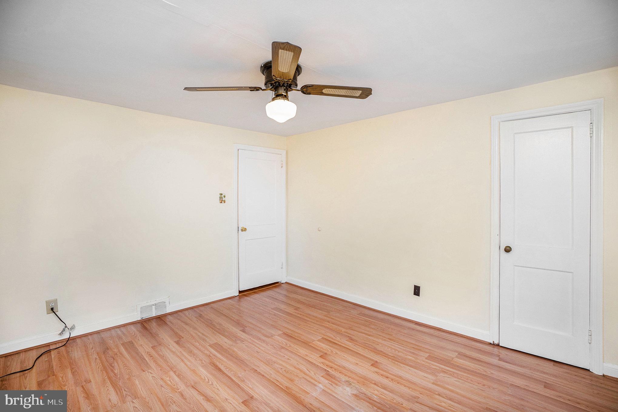 326 East Rambo Street Bridgeport, PA 19405 - Photo 18 of 26 a view of a room with wooden floor and ceiling fan