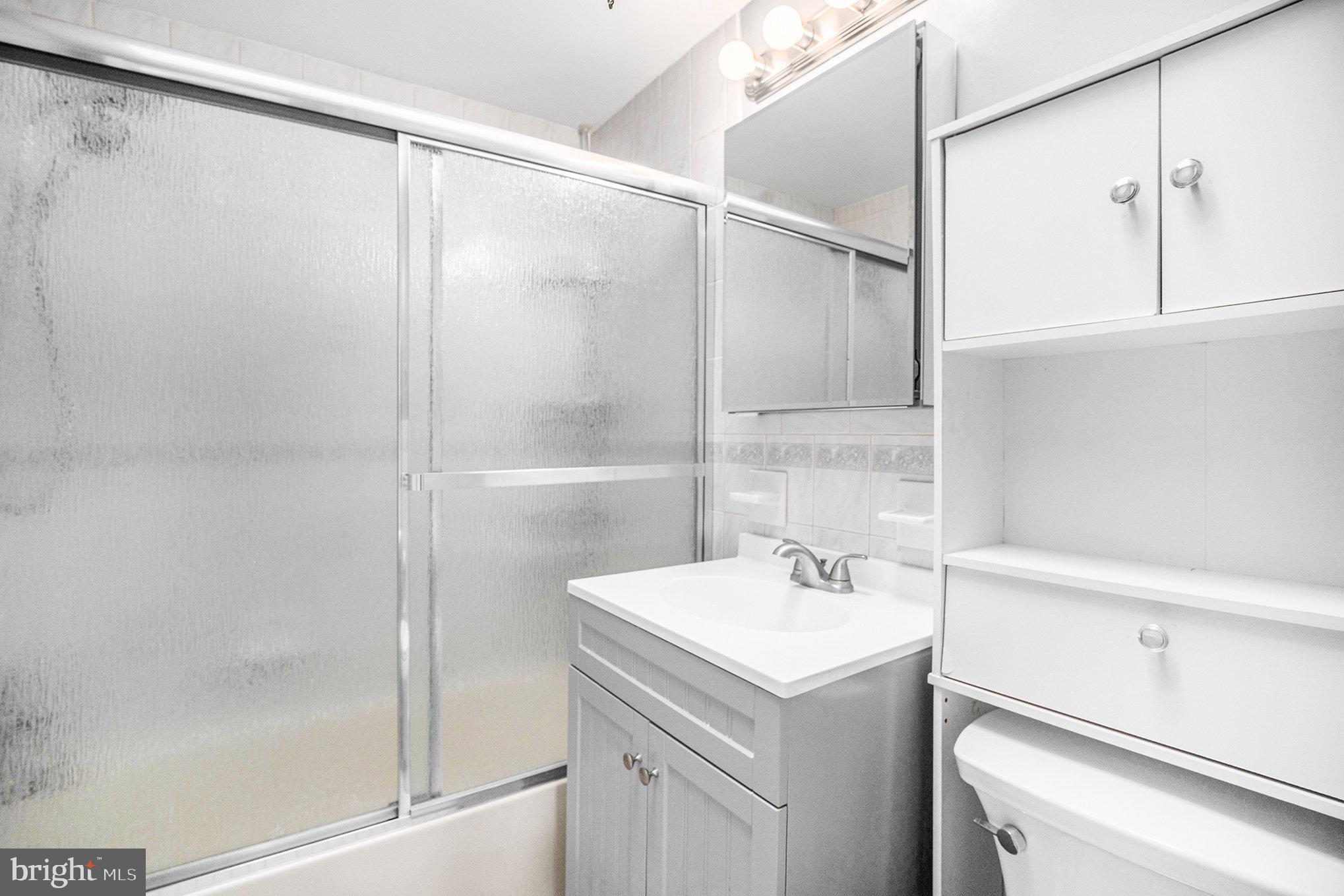 326 East Rambo Street Bridgeport, PA 19405 - Photo 20 of 26 a bathroom with a sink and mirror