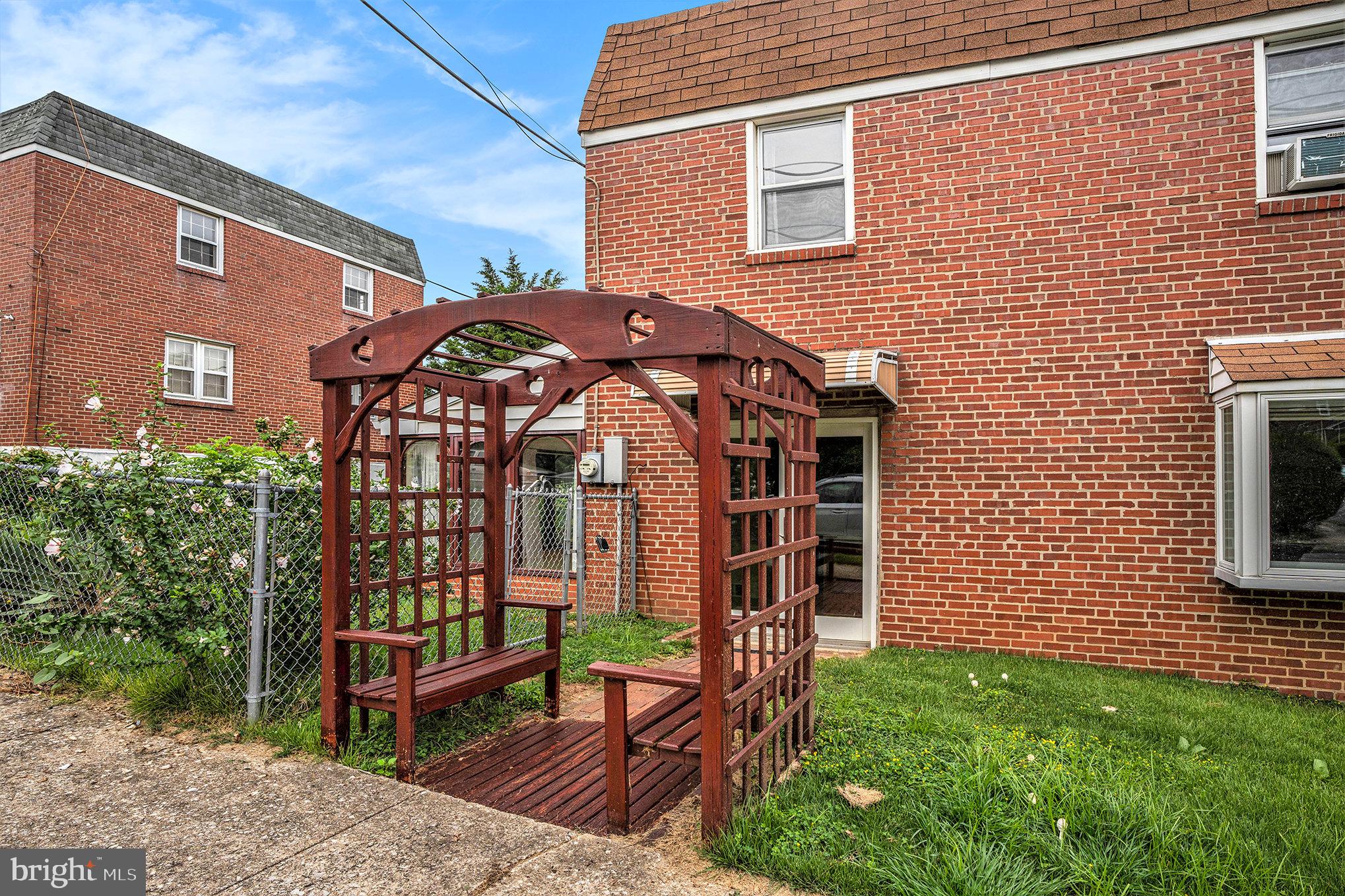 326 East Rambo Street Bridgeport, PA 19405 - Photo 2 of 26 a front view of a house with garden