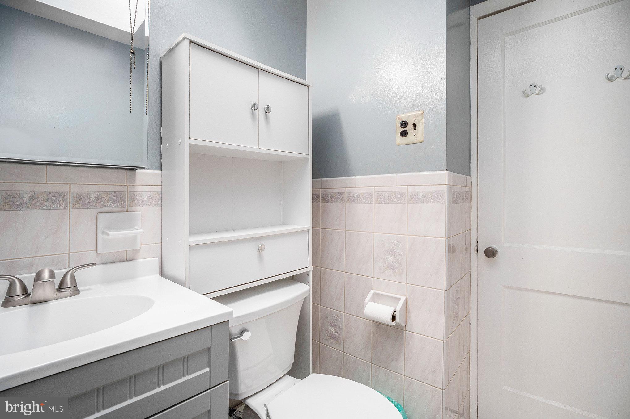 326 East Rambo Street Bridgeport, PA 19405 - Photo 21 of 26 a bathroom with a sink toilet vanity and shower