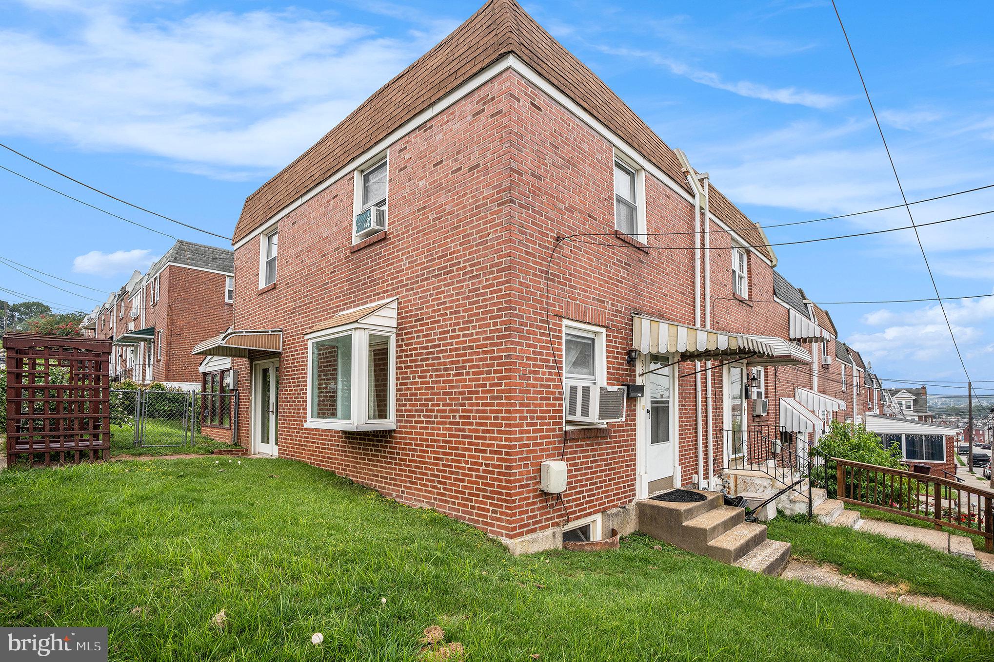 326 East Rambo Street Bridgeport, PA 19405 - Photo 3 of 26 a view of a house with a yard