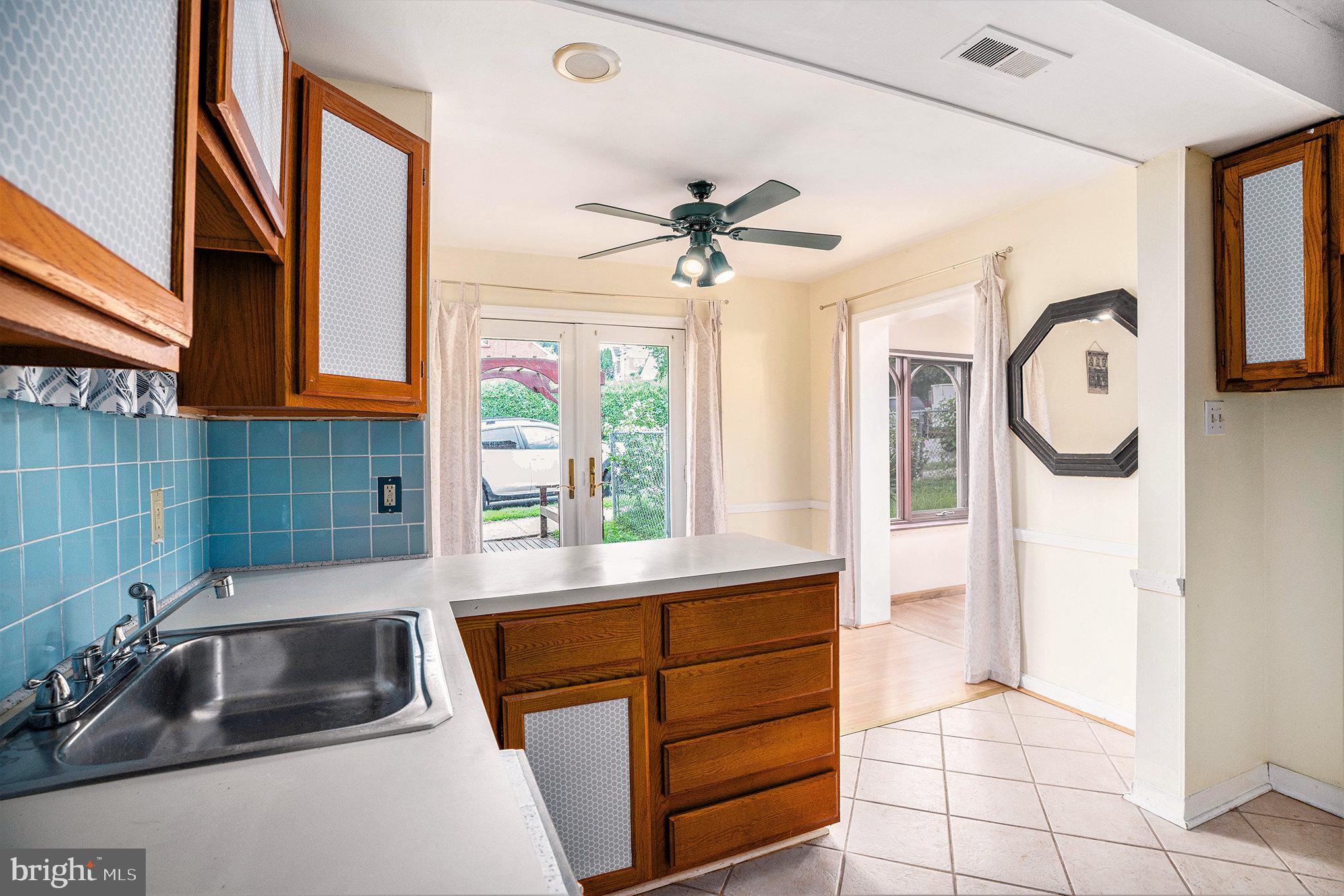 326 East Rambo Street Bridgeport, PA 19405 - Photo 8 of 26 a kitchen with a sink and a window
