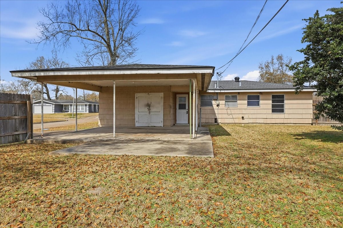1709 West Robin Avenue Orange, TX 77632 - Photo 20 of 24 a view of a house with a outdoor space