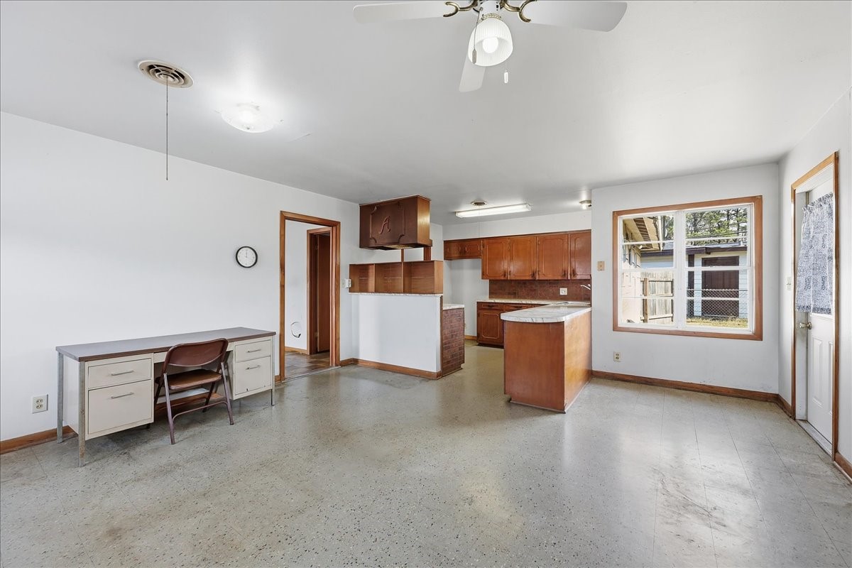 1709 West Robin Avenue Orange, TX 77632 - Photo 9 of 24 a view of a kitchen with furniture and a kitchen