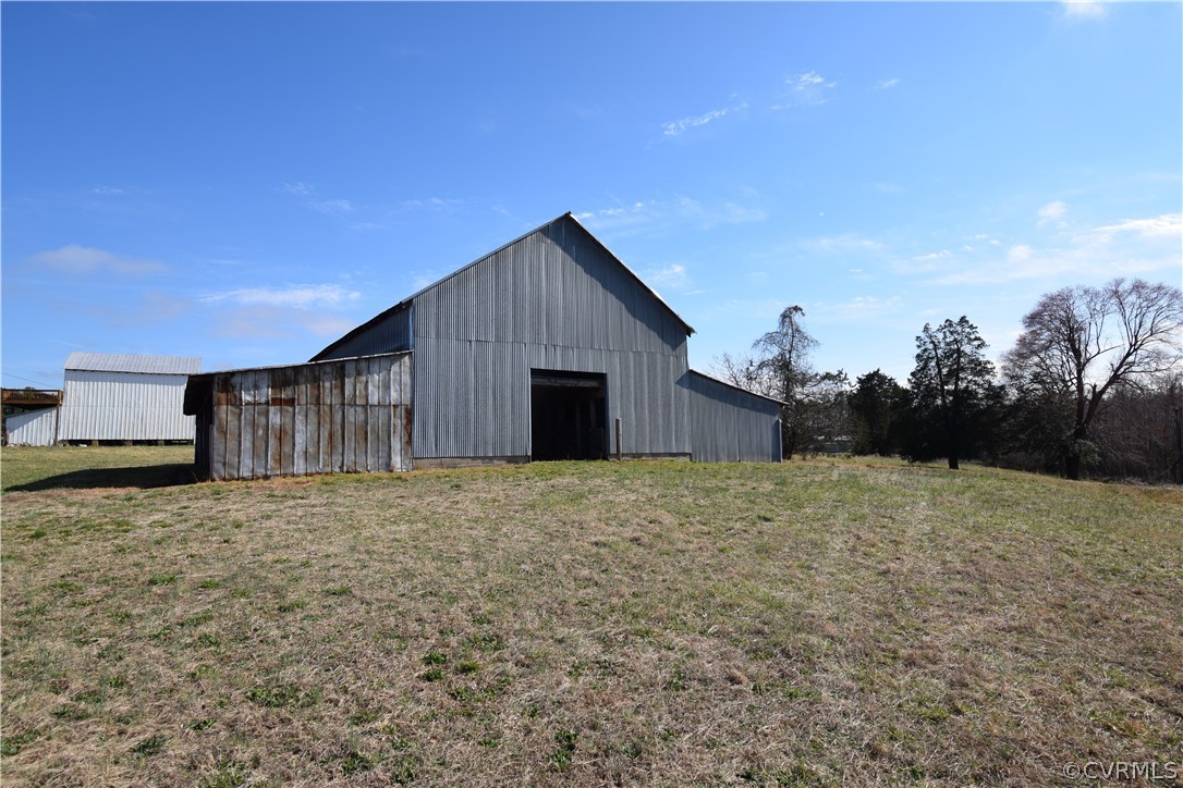 16600 Sandy Ford Road Chesterfield, VA 23838 - Photo 28 of 50 a house with trees in the background