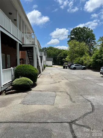 a view of a house with a street