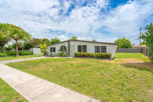 a front view of house with yard