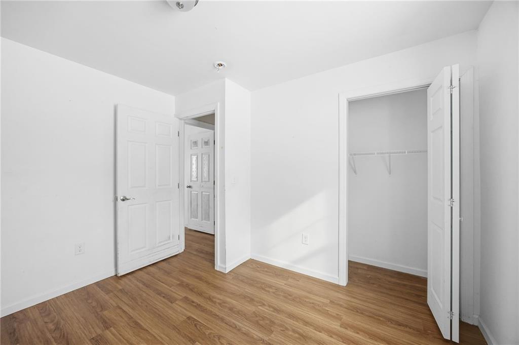 508 Fern Alley Duquesne, PA 15110 - Photo 12 of 18 a view of an empty room with wooden floor