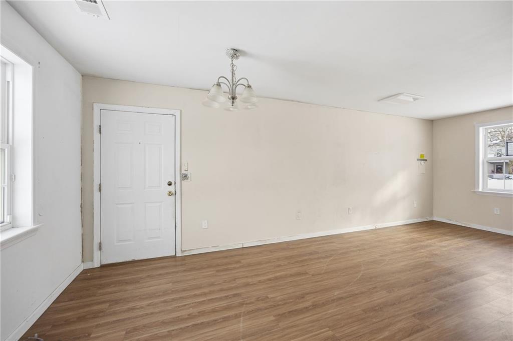 508 Fern Alley Duquesne, PA 15110 - Photo 3 of 18 wooden floor in an empty room with a window