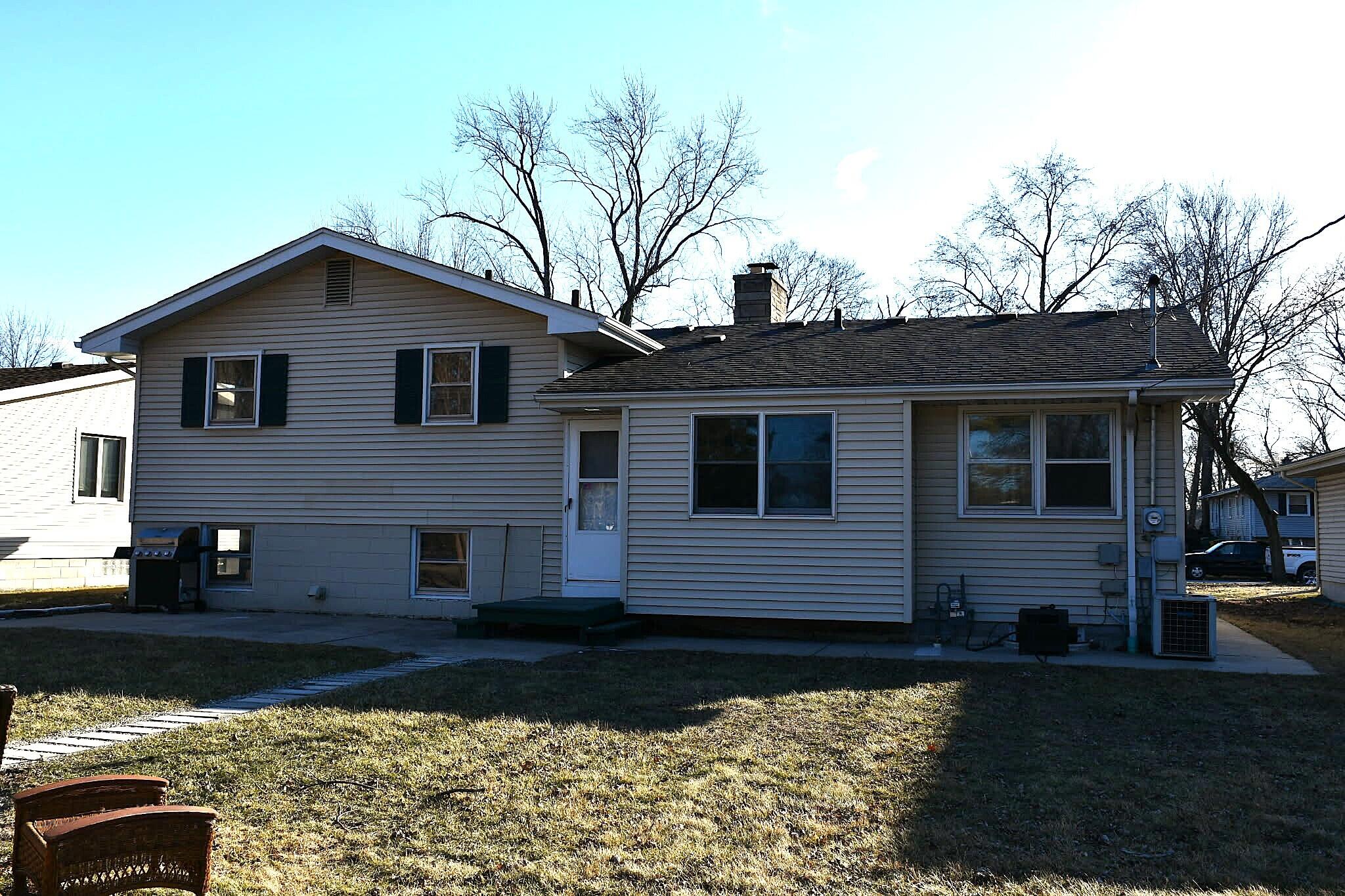 1645 Tulip Lane Munster, IN 46321 - Photo 19 of 23 a front view of a house with garden