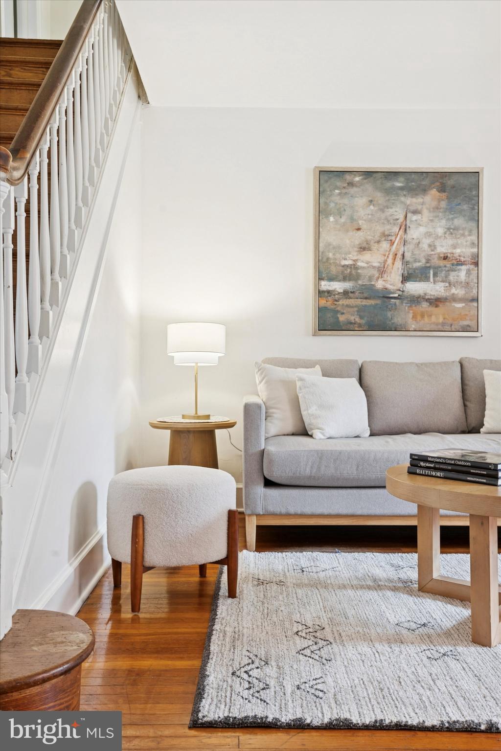 25 Green Valley Road Wallingford, PA 19086 - Photo 19 of 63 a living room with furniture and a rug
