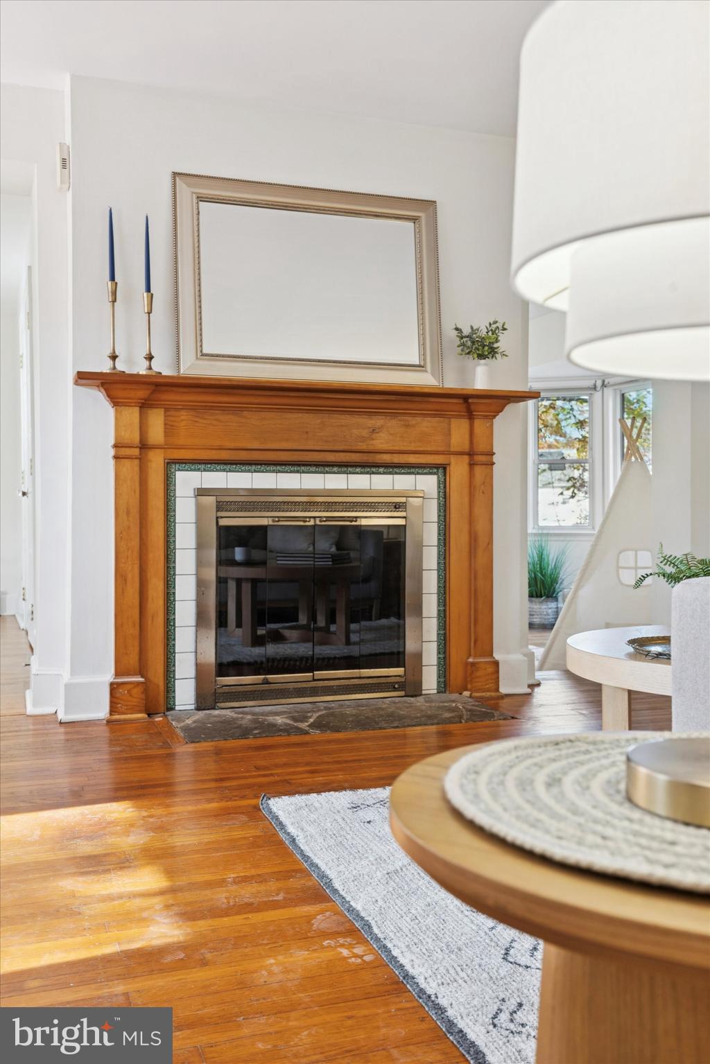 25 Green Valley Road Wallingford, PA 19086 - Photo 20 of 63 a view of a livingroom with furniture and a fireplace