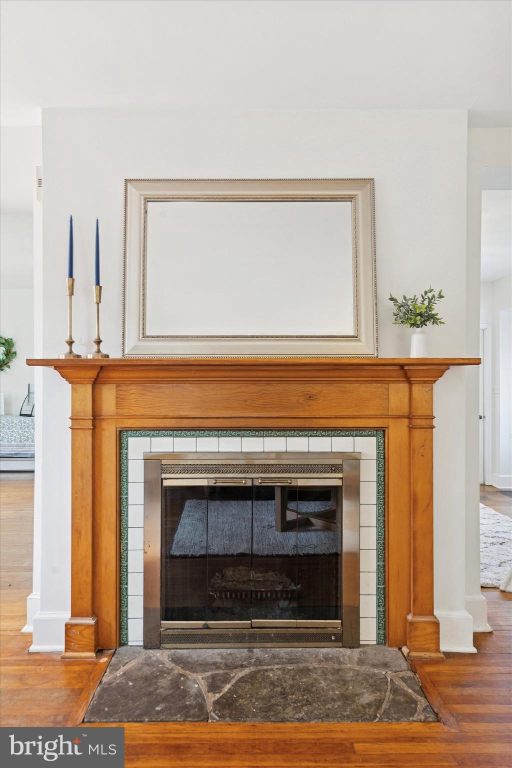 25 Green Valley Road Wallingford, PA 19086 - Photo 22 of 63 a view of a livingroom with a fireplace and window