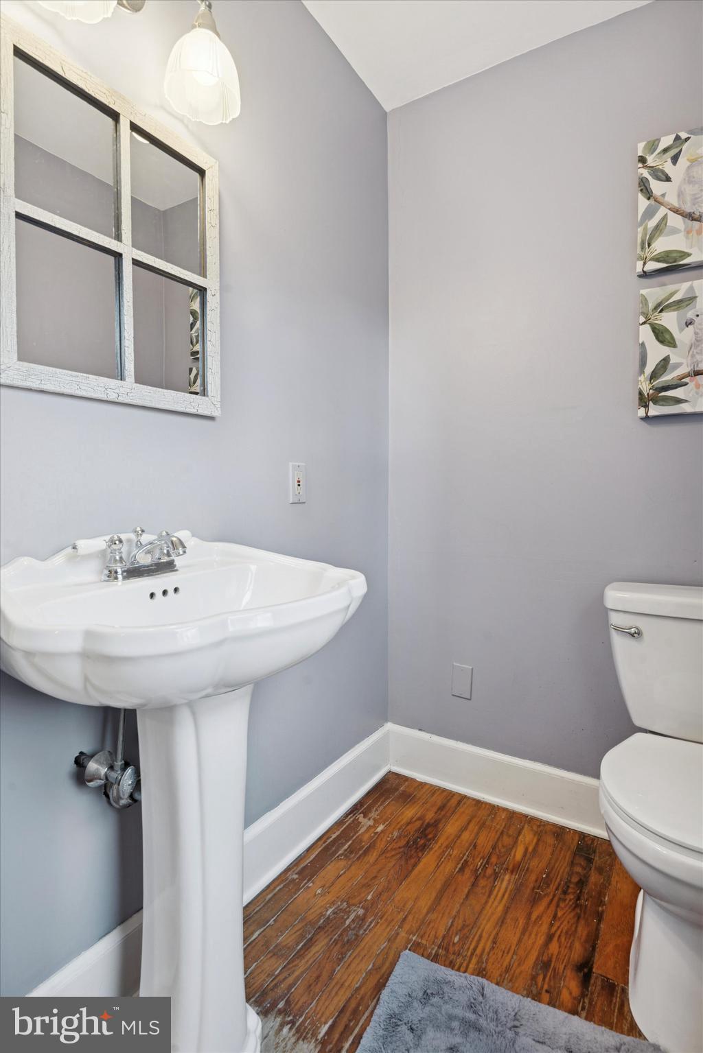 25 Green Valley Road Wallingford, PA 19086 - Photo 33 of 63 a bathroom with a sink and a toilet