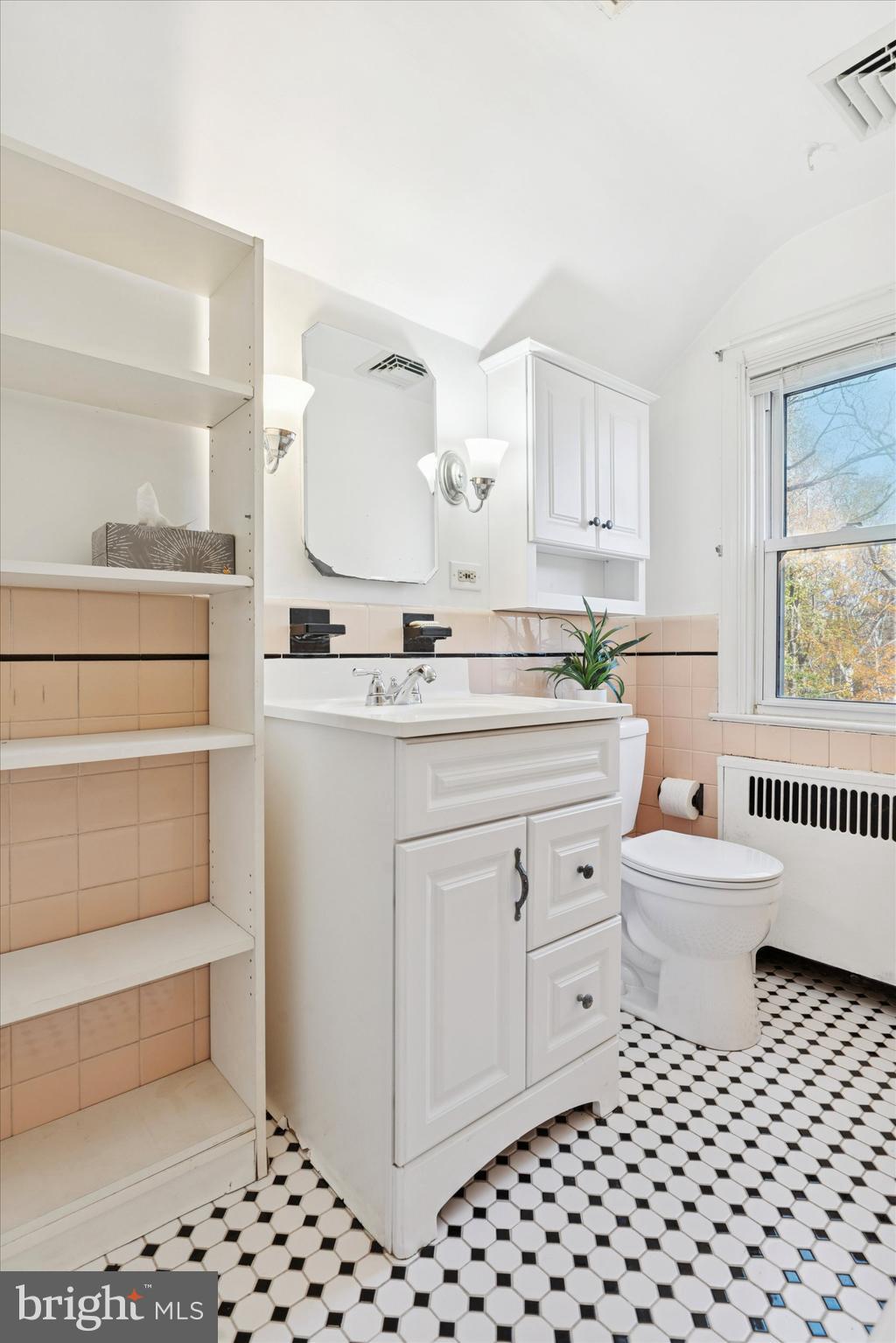 25 Green Valley Road Wallingford, PA 19086 - Photo 37 of 63 a bathroom with a sink a toilet and shower