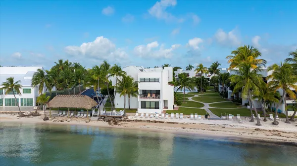 a view of a lake with a building in the background