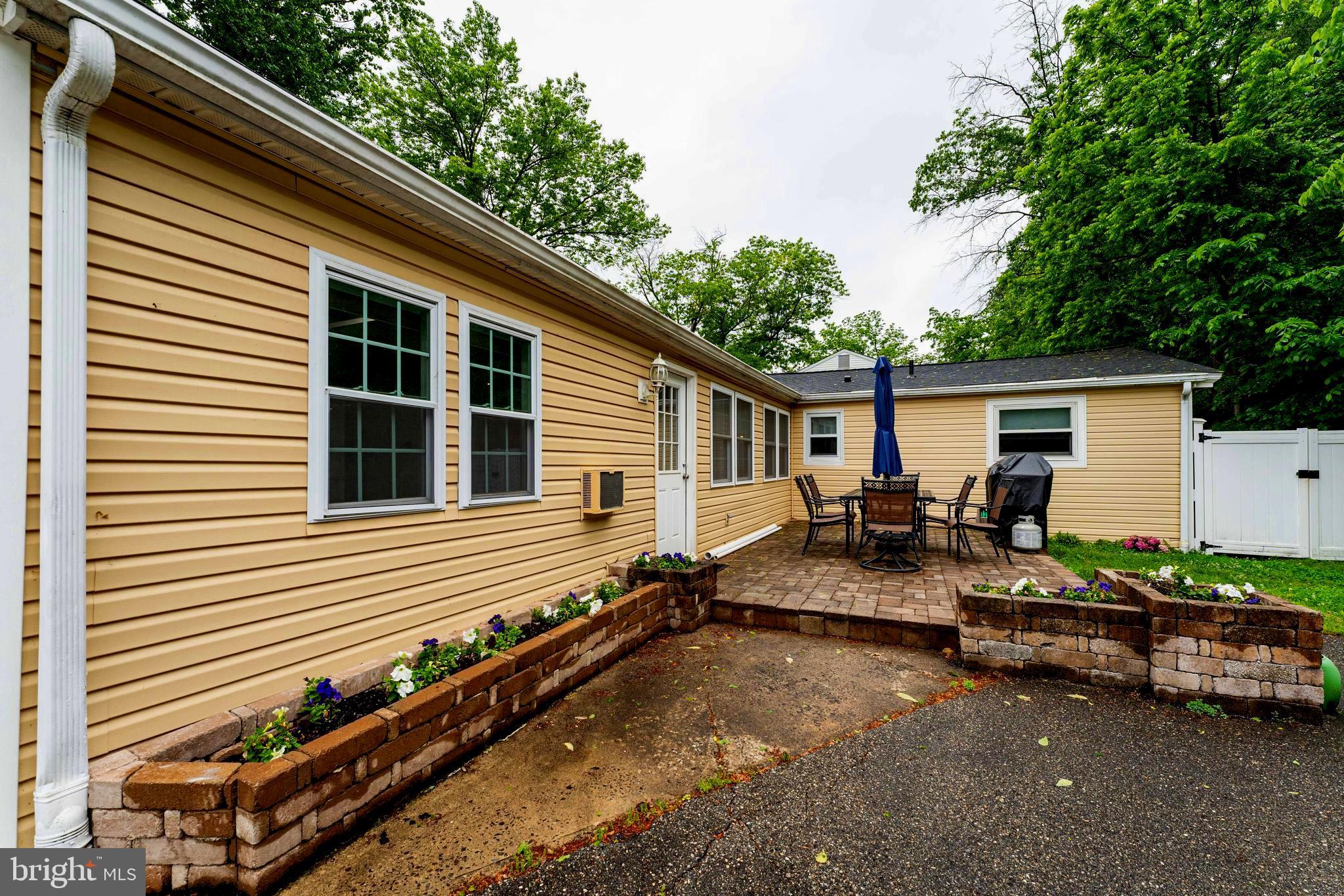 2941 Pheasant Run Road Norristown, PA 19403 - Photo 6 of 23 a view of house with backyard and sitting area