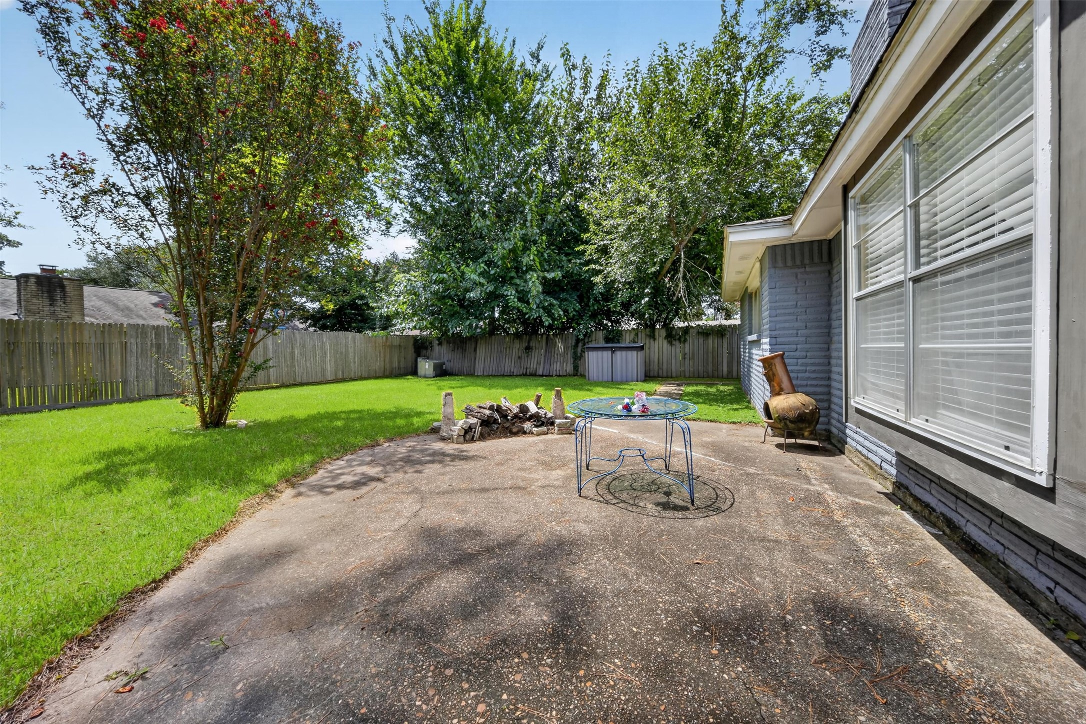 23127 Harpergate Drive Spring, TX 77373 - Photo 20 of 26 Large backyard creates the perfect backdrop for family gatherings.
